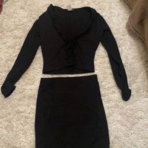 Black skirt set , never worn .